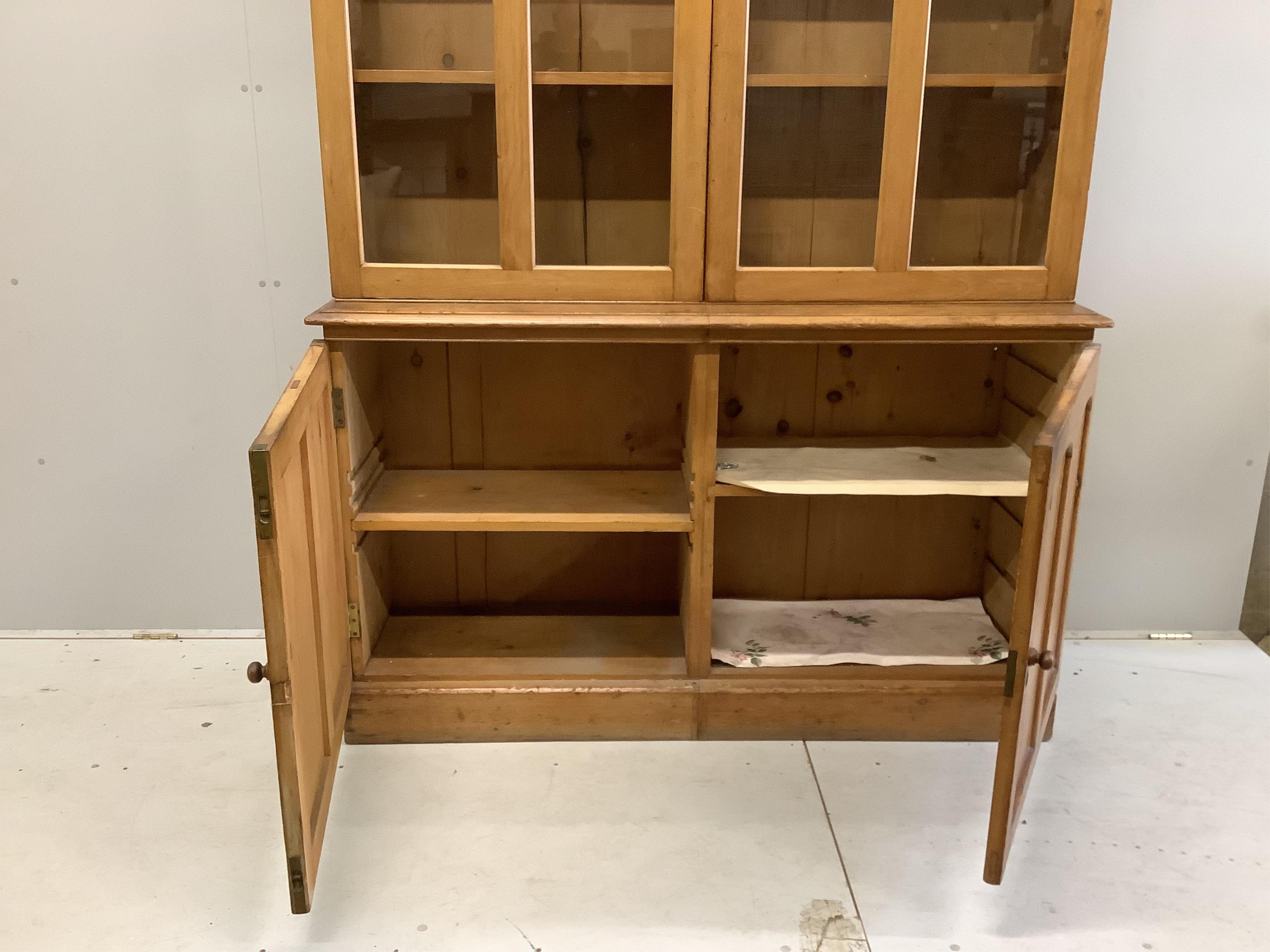 A Victorian pine library bookcase, width 154cm, depth 46cm, height 242cm. Condition - fair